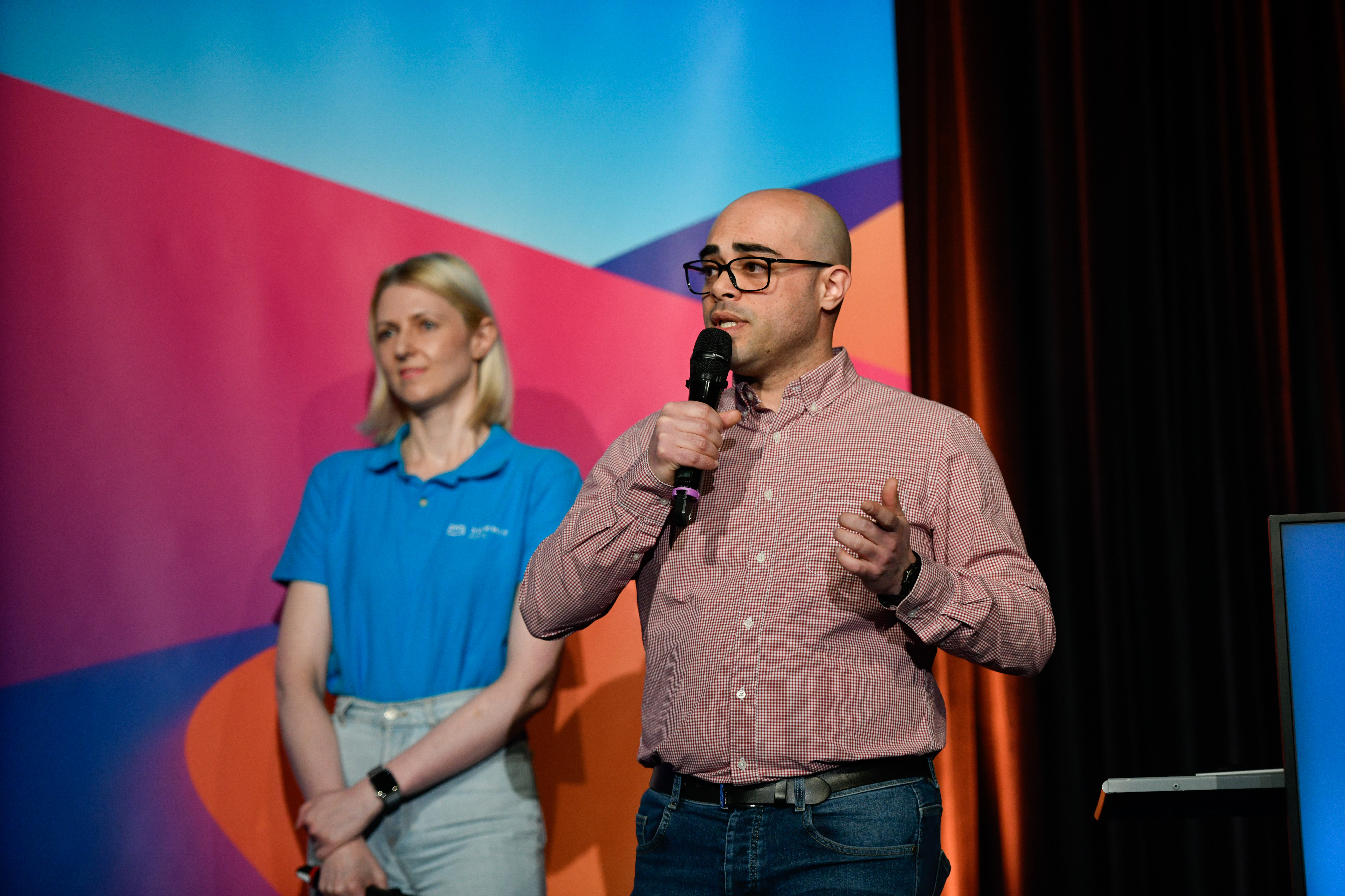 Ramzi Trabelsi presenting at AWS Summit Paris 2025